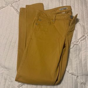 EXPRESS Mustard 5 pocket stretch skinny jeans.